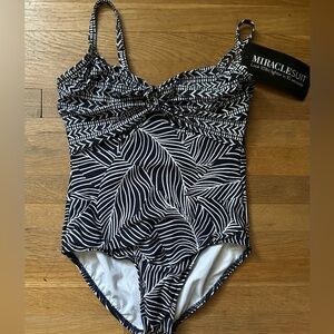 NWT Miraclesuit One piece swimsuit Navy, White, Silver with bow accent size 12